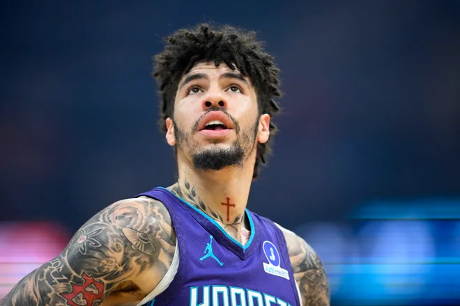 Dec 22, 2025; Cleveland, Ohio, USA; Charlotte Hornets guard Lamelo Ball (1) stands on the court in the first quarter against the Cleveland Cavaliers at Rocket Arena. Mandatory Credit: David Richard-Imagn Images