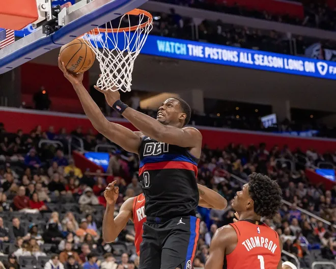 Jan 23, 2026; Detroit, Michigan, USA; Detroit Pistons center Jalen Duren (0) drives to the basket for two points against the Houston Rockets during the second half at Little Caesars Arena.