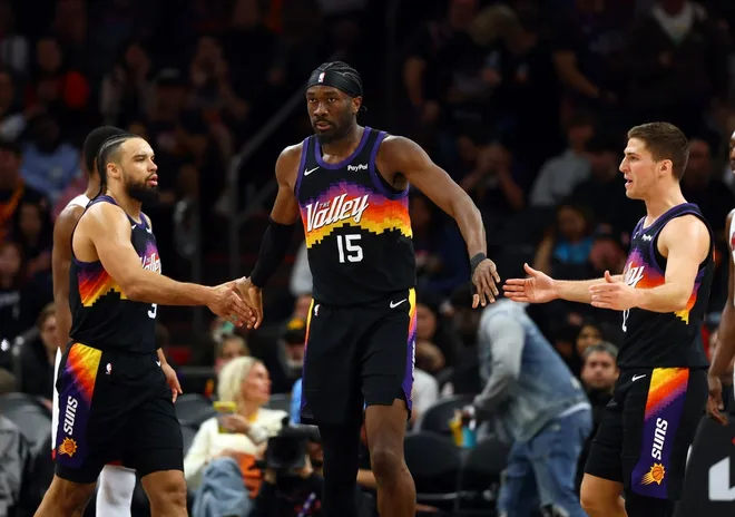 Jan 25, 2026; Phoenix, Arizona, USA; Phoenix Suns center Mark Williams (15) celebrates a play with forward Dillon Brooks (3) and guard Collin Gillespie (12) against the Miami Heat in the second half at Mortgage Matchup Center.