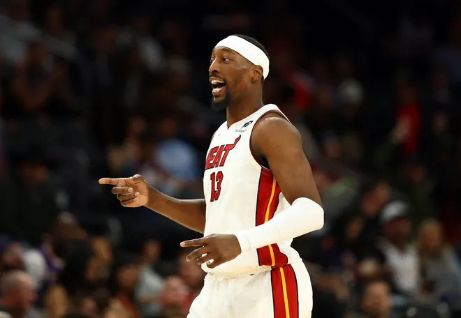 Jan 25, 2026; Phoenix, Arizona, USA; Miami Heat center Bam Adebayo (13) reacts against the Phoenix Suns in the second half at Mortgage Matchup Center.