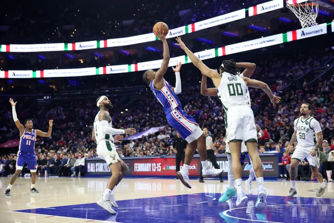 Jan 27, 2026; Philadelphia, Pennsylvania, USA; Philadelphia 76ers guard Tyrese Maxey (0) drives for a shot against the Milwaukee Bucks during the third quarter at Xfinity Mobile Arena. Mandatory Credit: Bill Streicher-Imagn Images