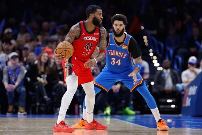Jan 27, 2026; Oklahoma City, Oklahoma, USA; New Orleans Pelicans guard/forward Saddiq Bey (41) moves the ball as Oklahoma City Thunder guard/forward Kenrich Williams (34) during the second half at Paycom Center. Mandatory Credit: Alonzo Adams-Imagn Images