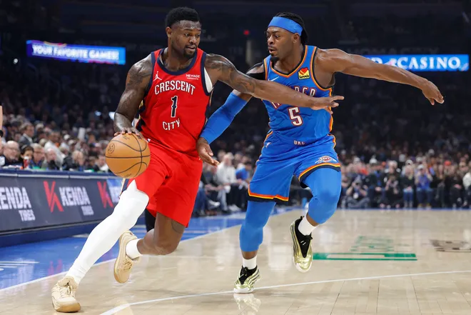 Jan 27, 2026; Oklahoma City, Oklahoma, USA; New Orleans Pelicans forward Zion Williamson (1) drives around Oklahoma City Thunder guard Luguentz Dort (5) during the second quarter at Paycom Center. Mandatory Credit: Alonzo Adams-Imagn Images