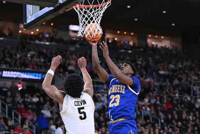 Mar 22, 2025; Providence, RI, USA; McNeese State Cowboys guard Brandon Murray (23) shoots against Purdue Boilermakers guard Myles Colvin (5) during the second half of a second round men’s NCAA Tournament game at Amica Mutual Pavilion.