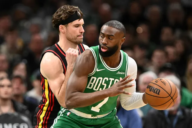 Jan 28, 2026; Boston, Massachusetts, USA; Boston Celtics guard Jaylen Brown (7) controls the ball against against the Atlanta Hawks during the first half at the TD Garden. Mandatory Credit: Brian Fluharty-Imagn Images