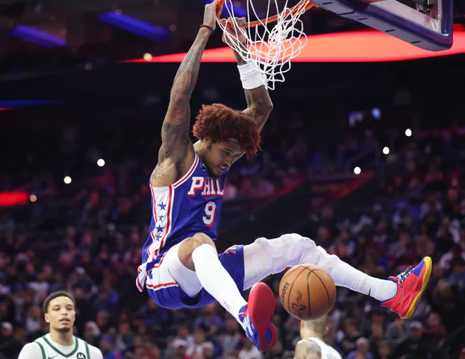 Jan 27, 2026; Philadelphia, Pennsylvania, USA; Philadelphia 76ers guard Kelly Oubre Jr. (9) dunks the ball against the Milwaukee Bucks during the third quarter at Xfinity Mobile Arena. Mandatory Credit: Bill Streicher-Imagn Images