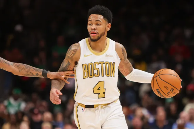 Jan 17, 2026; Atlanta, Georgia, USA; Boston Celtics guard Anfernee Simons (4) dribbles against the Atlanta Hawks in the fourth quarter at State Farm Arena. Mandatory Credit: Brett Davis-Imagn Images