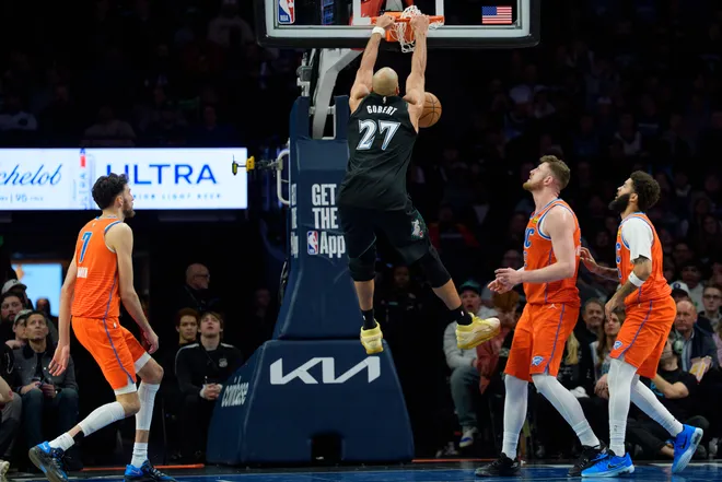 Jan 29, 2026; Minneapolis, Minnesota, USA; Minnesota Timberwolves center Rudy Gobert (27) dunks on the Oklahoma City Thunder in the third quarter at Target Center. Mandatory Credit: Matt Blewett-Imagn Images