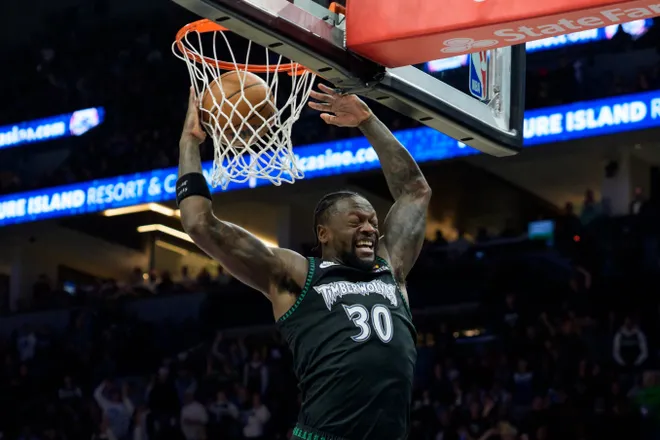 Jan 29, 2026; Minneapolis, Minnesota, USA; Minnesota Timberwolves forward Julius Randle (30) dunks agains the Oklahoma City Thunder in the second quarter at Target Center. Mandatory Credit: Matt Blewett-Imagn Images