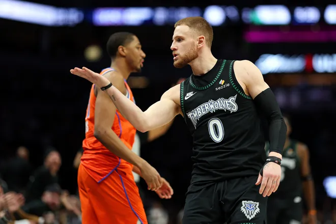 MINNEAPOLIS, MINNESOTA - JANUARY 29: Donte DiVincenzo #0 of the Minnesota Timberwolves blows a kiss to a fan in the third quarter against the Oklahoma City Thunder at Target Center on January 29, 2026 in Minneapolis, Minnesota. The Timberwolves defeated the Thunder 123-111. NOTE TO USER: User expressly acknowledges and agrees that, by downloading and or using this photograph, User is consenting to the terms and conditions of the Getty Images License Agreement. (Photo by David Berding/Getty Images)