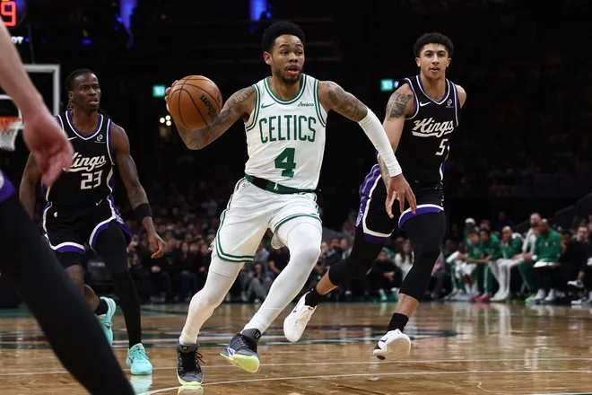 Jan 30, 2026; Boston, Massachusetts, USA; Boston Celtics guard Anfernee Simons (4) drives against the Sacramento Kings during the second half at TD Garden. Mandatory Credit: Winslow Townson-Imagn Images