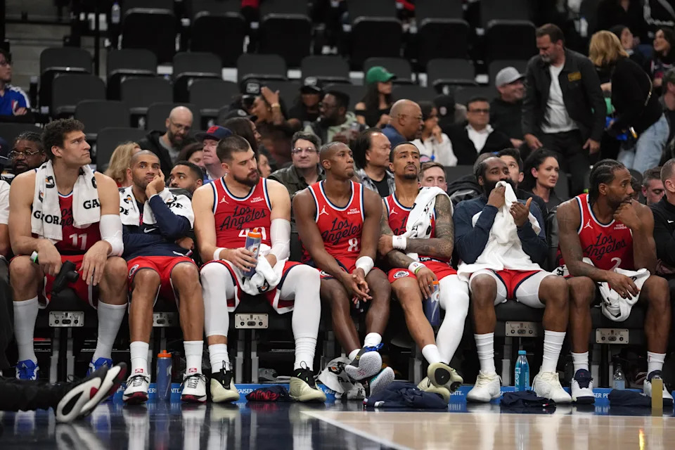 Jan 3, 2026; Inglewood, California, USA; LA Clippers players watch from the bench in the fourth quarter against the Boston Celtics at the Intuit Dome. Mandatory Credit: Kirby Lee-Imagn Images
