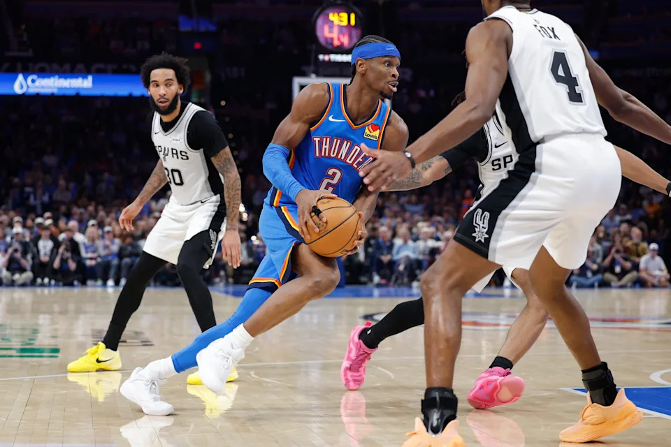 Jan 13, 2026; Oklahoma City, Oklahoma, USA; Oklahoma City Thunder guard Shai Gilgeous-Alexander (2) drives to the basket against the San Antonio Spurs during the second half at Paycom Center. Mandatory Credit: Alonzo Adams-Imagn Images