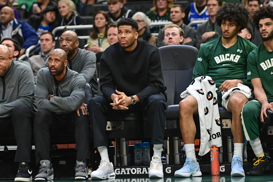 Dec 11, 2025; Milwaukee, Wisconsin, USA; Milwaukee Bucks forward Giannis Antetokounmpo (34) watches the game against the Boston Celtics from the bench in the second quarter at Fiserv Forum. Mandatory Credit: Benny Sieu-Imagn Images