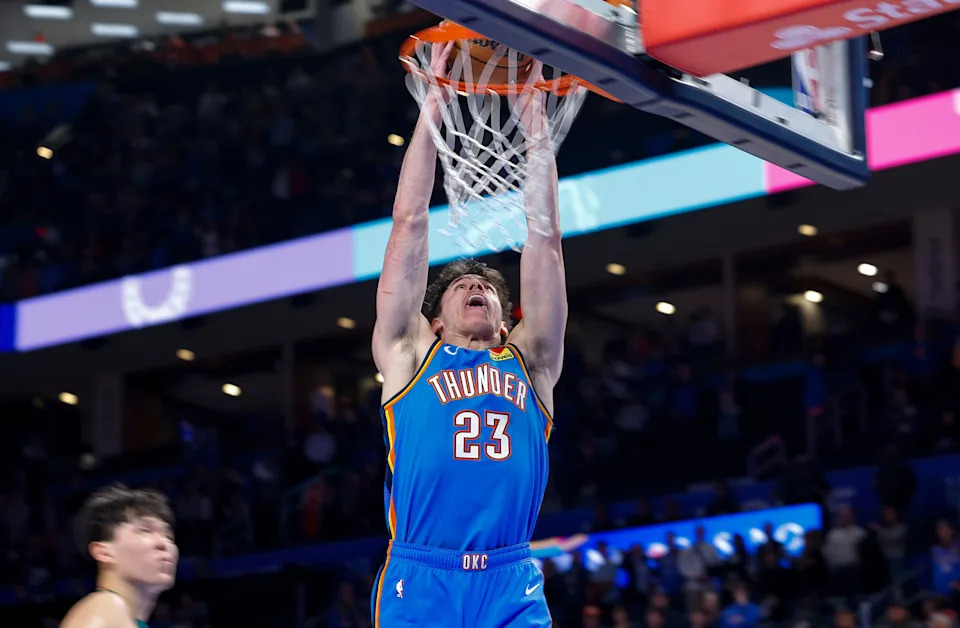 Nov 23, 2025; Oklahoma City, Oklahoma, USA; Oklahoma City Thunder forward Brooks Barnhizer (23) dunks against the Portland Trail Blazers during the second half at Paycom Center. Mandatory Credit: Alonzo Adams-Imagn Images