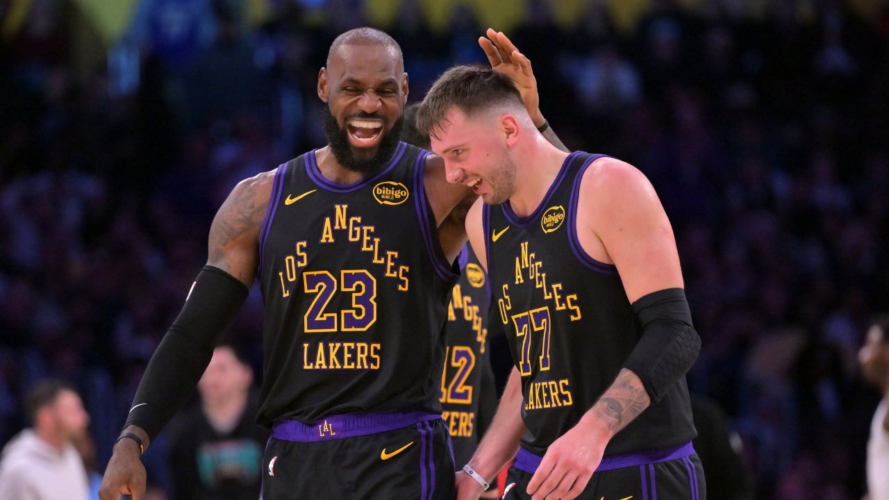 Los Angeles Lakers guard Luka Doncic (77) and forward LeBron James (23) during the second quarter against the Minnesota Timberwolves at Crypto.com Arena.