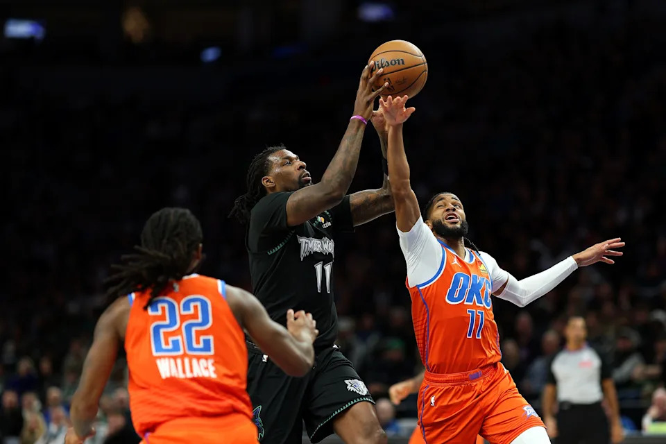 MINNEAPOLIS, MINNESOTA - JANUARY 29: Naz Reid #11 of the Minnesota Timberwolves drives to the basket against Isaiah Joe #11 of the Oklahoma City Thunder in the fourth quarter at Target Center on January 29, 2026 in Minneapolis, Minnesota. The Timberwolves defeated the Thunder 123-111. NOTE TO USER: User expressly acknowledges and agrees that, by downloading and or using this photograph, User is consenting to the terms and conditions of the Getty Images License Agreement. (Photo by David Berding/Getty Images)