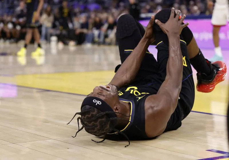 Jan 19, 2026; San Francisco, California, USA; Golden State Warriors forward Jimmy Butler III (10) holds his right knee as he goes down with an injury during the third quarter against the Miami Heat at Chase Center. Mandatory Credit: Kelley L Cox-Imagn Images