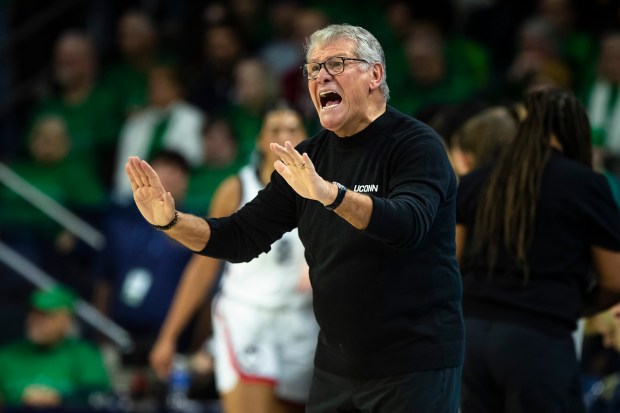 UConn head coach Geno Auriemma shouts towards the court during the second half of an NCAA college basketball game against UConn Thursday, Dec. 12, 2024, in South Bend, Ind. (AP Photo/Michael Caterina)