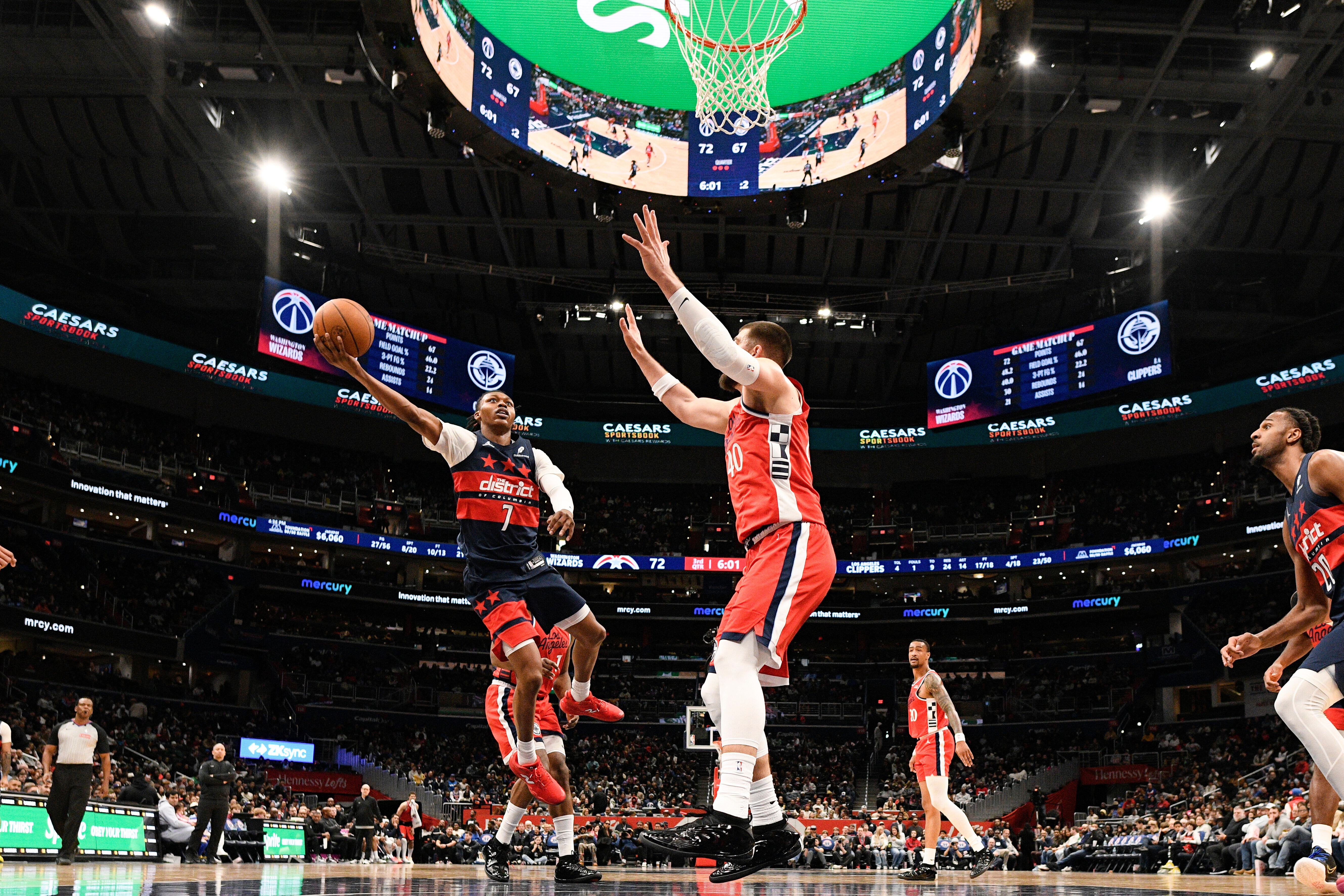 Washington Wizards guard Bub Carrington (7) looks to shoot as...