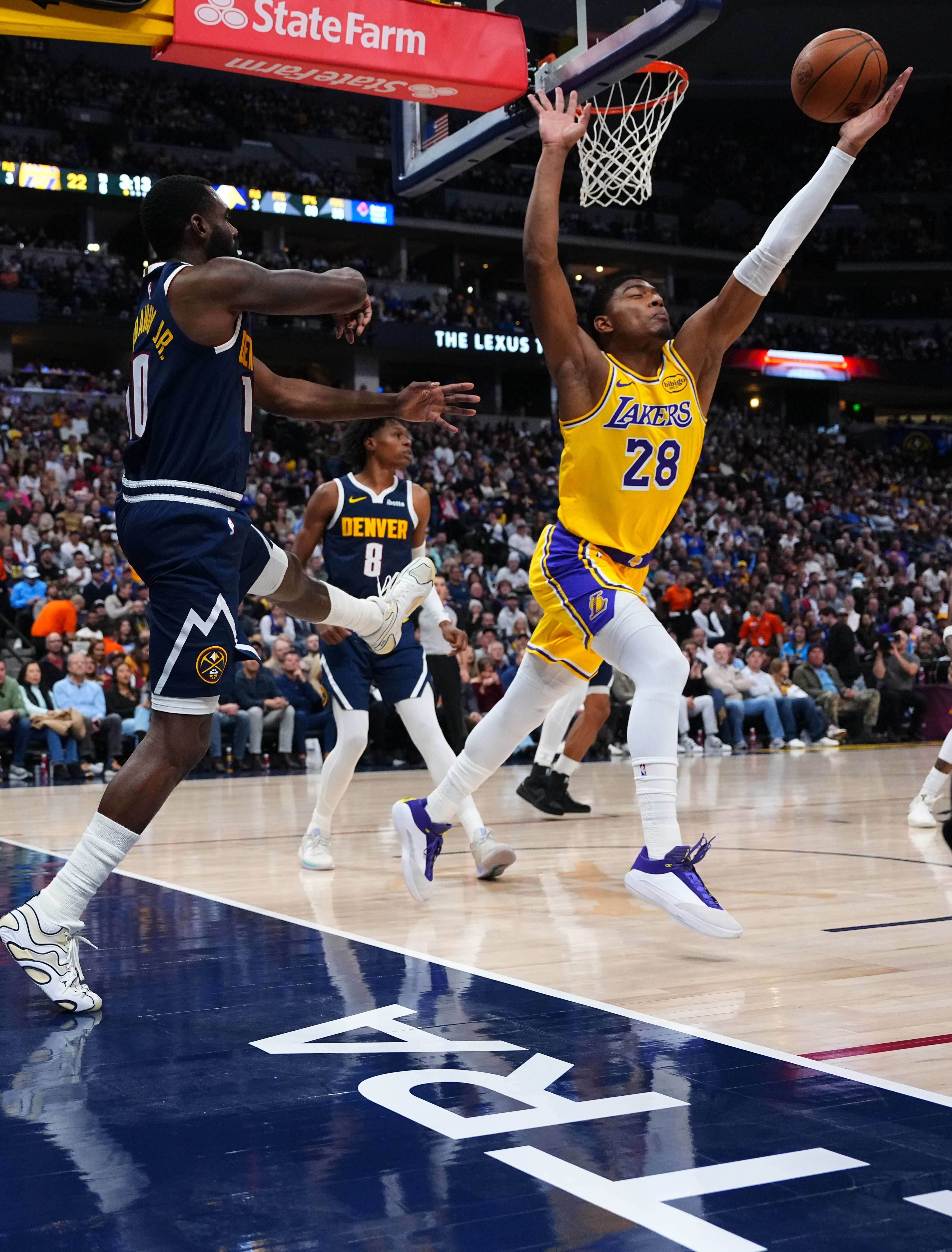 Lakers forward Rui Hachimura (28) blocks a pass by Denver...