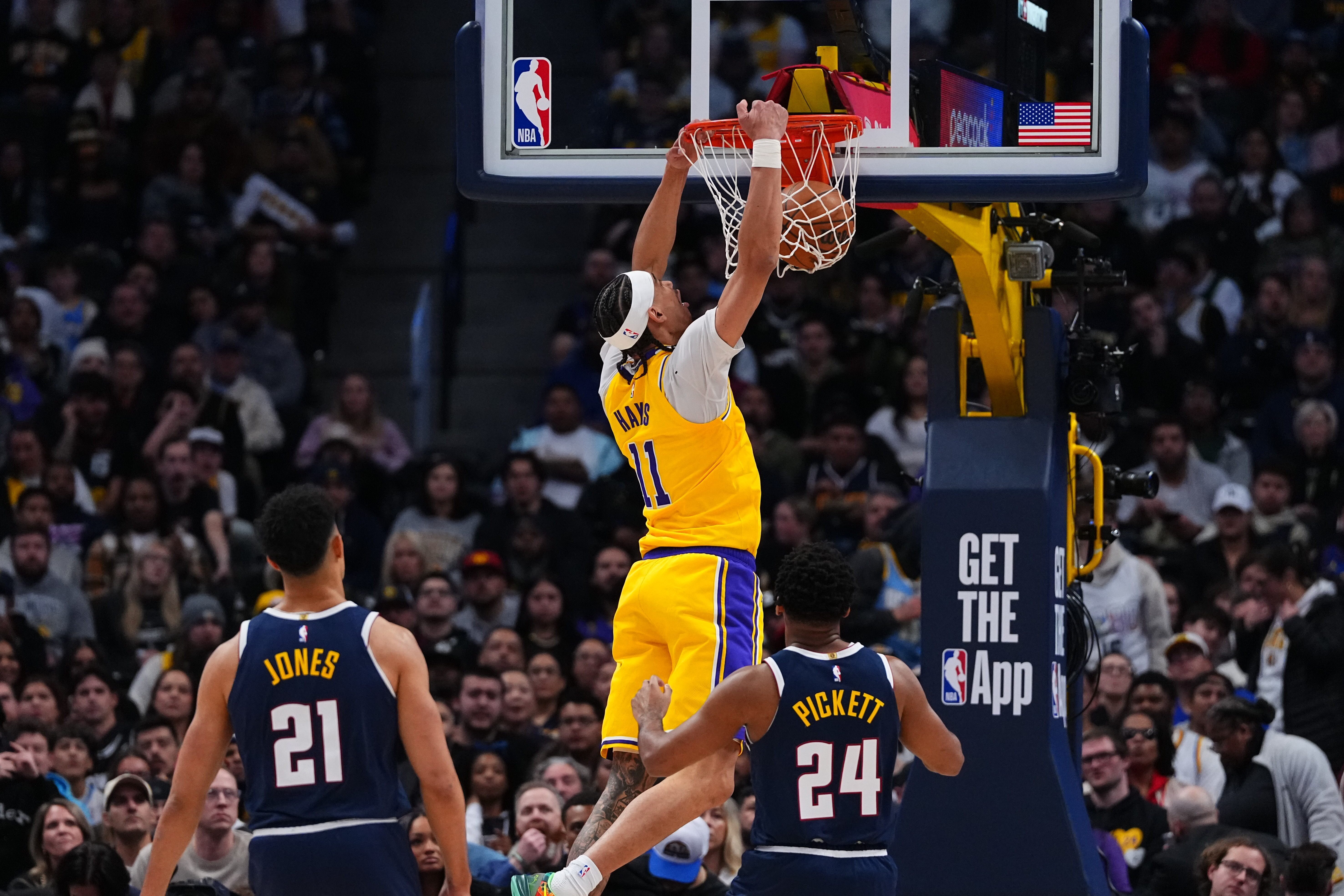 Lakers center Jaxson Hayes (11). dunks against the Denver Nuggets...
