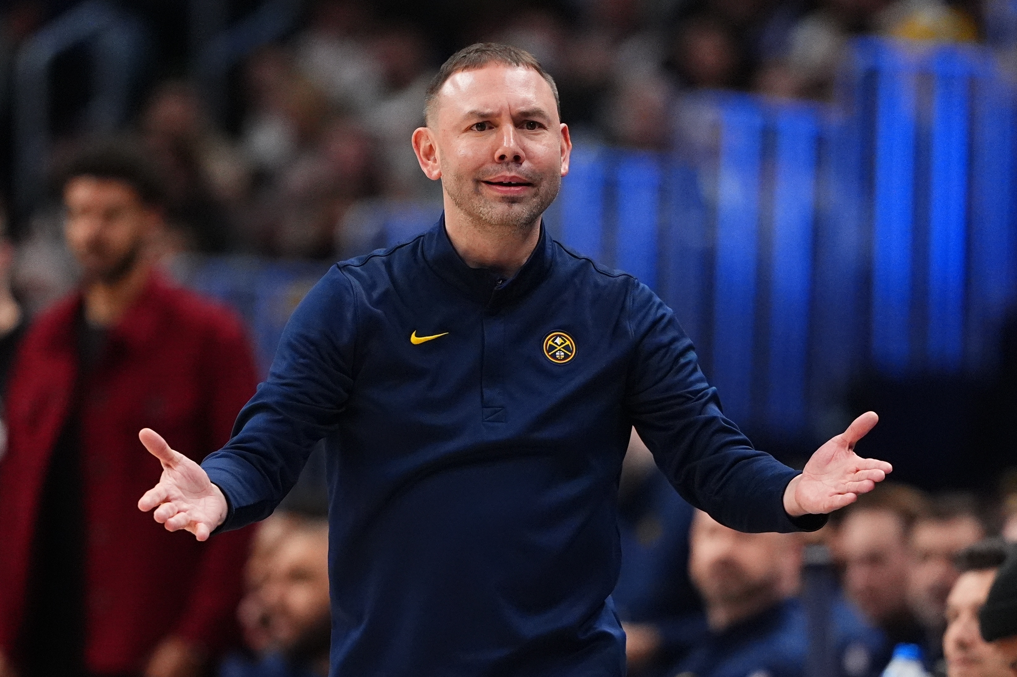 Denver Nuggets head coach David Adelman reacts during the second...