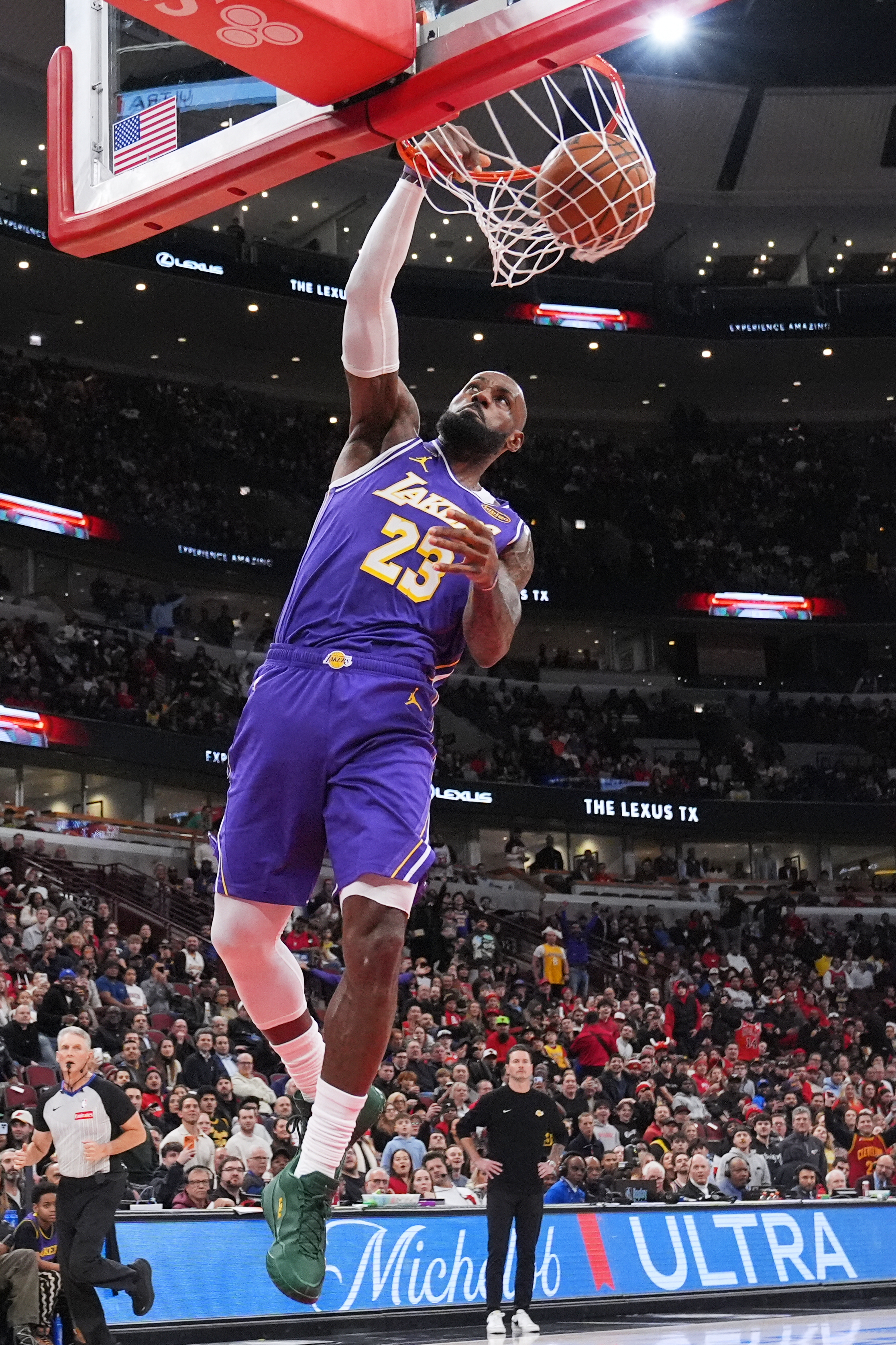 Lakers forward LeBron James dunks during the first half of...