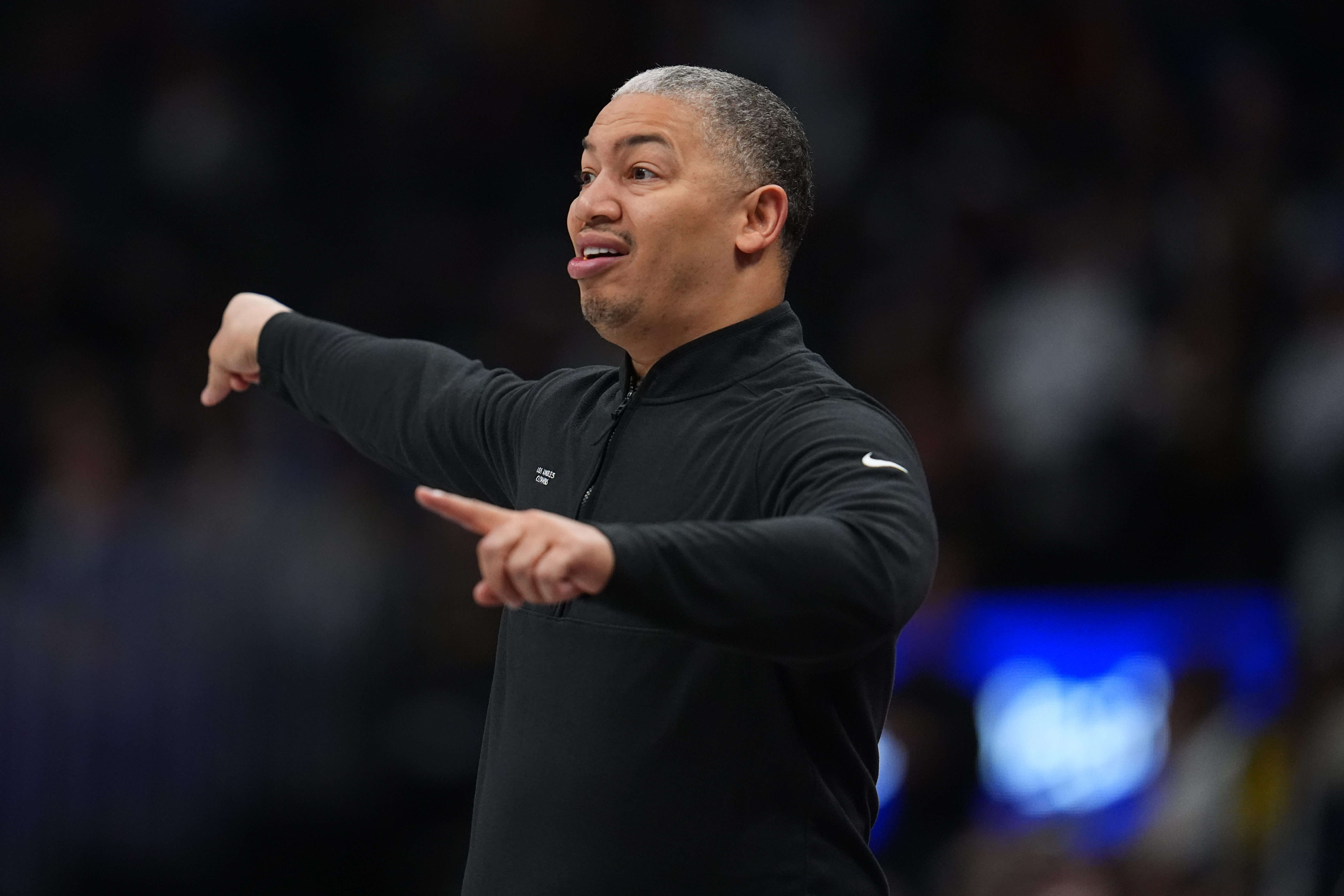 Clippers head coach Tyronn Lue directs his team from the...