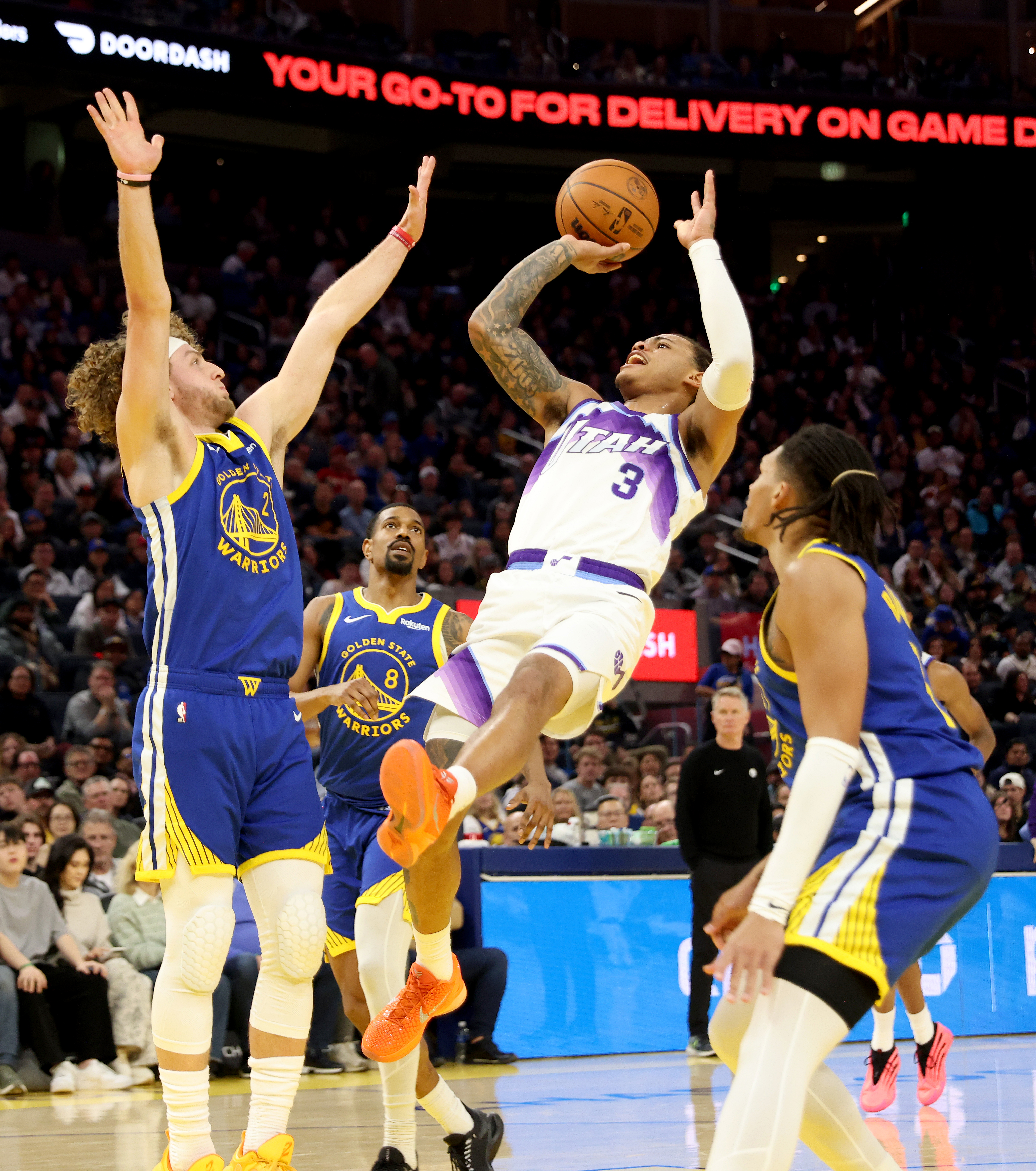 Golden State Warriors’ Brandin Podziemski #2 was called for a...