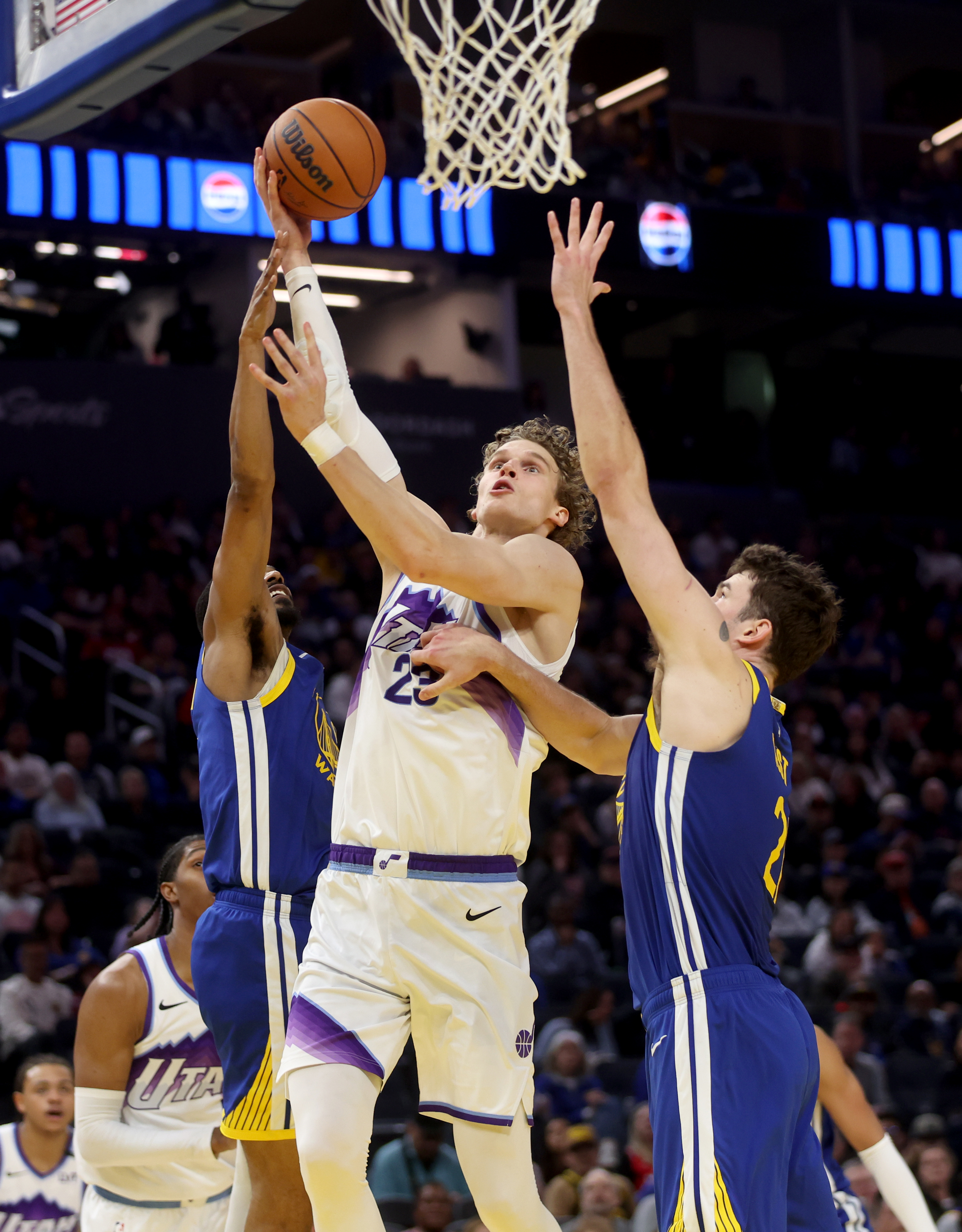 Golden State Warriors’ Quinten Post #21 and De’anthony Melton #8...