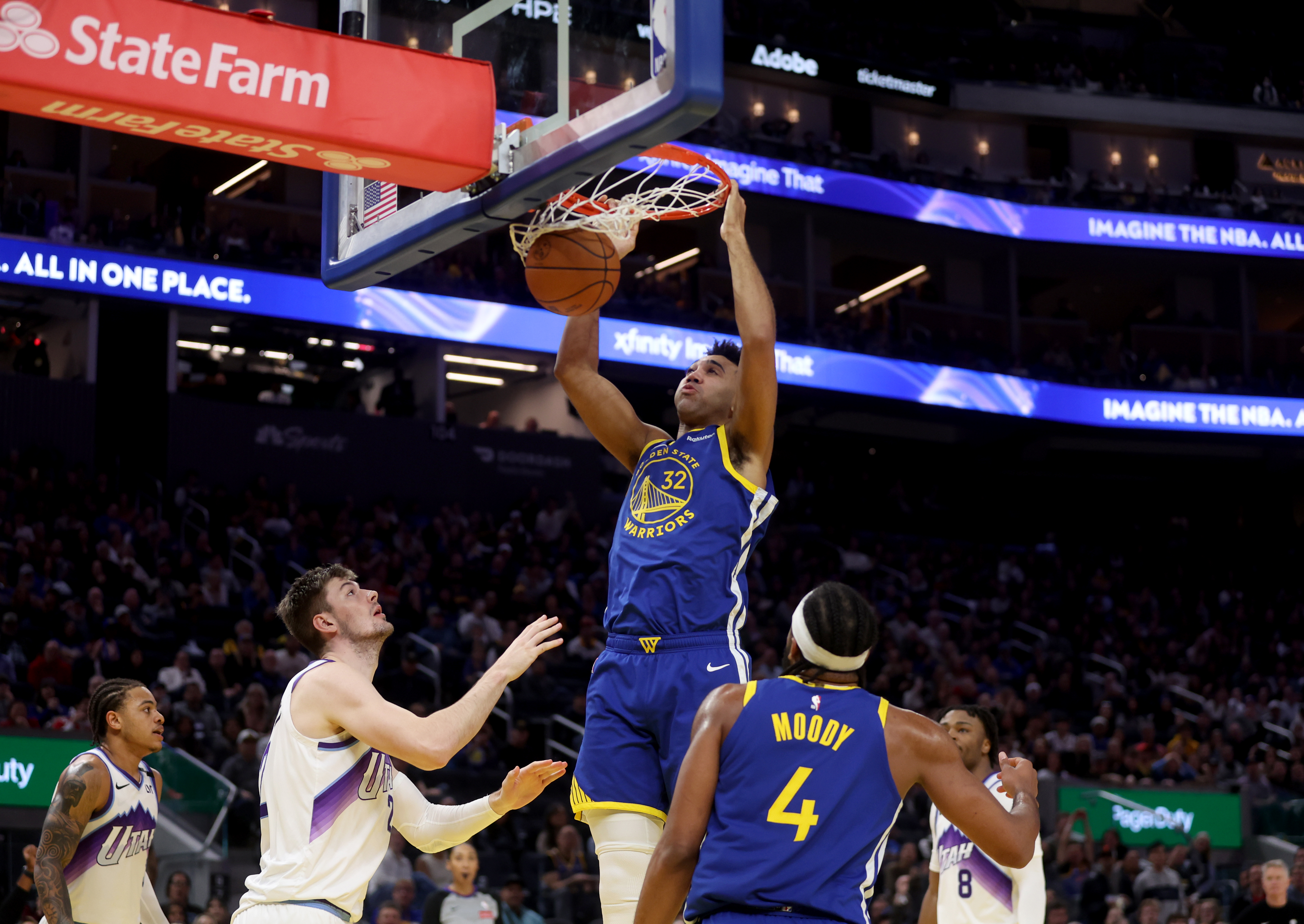 Golden State Warriors’ Trayce Jackson-Davis #32 dunks past Utah Jazz’s...