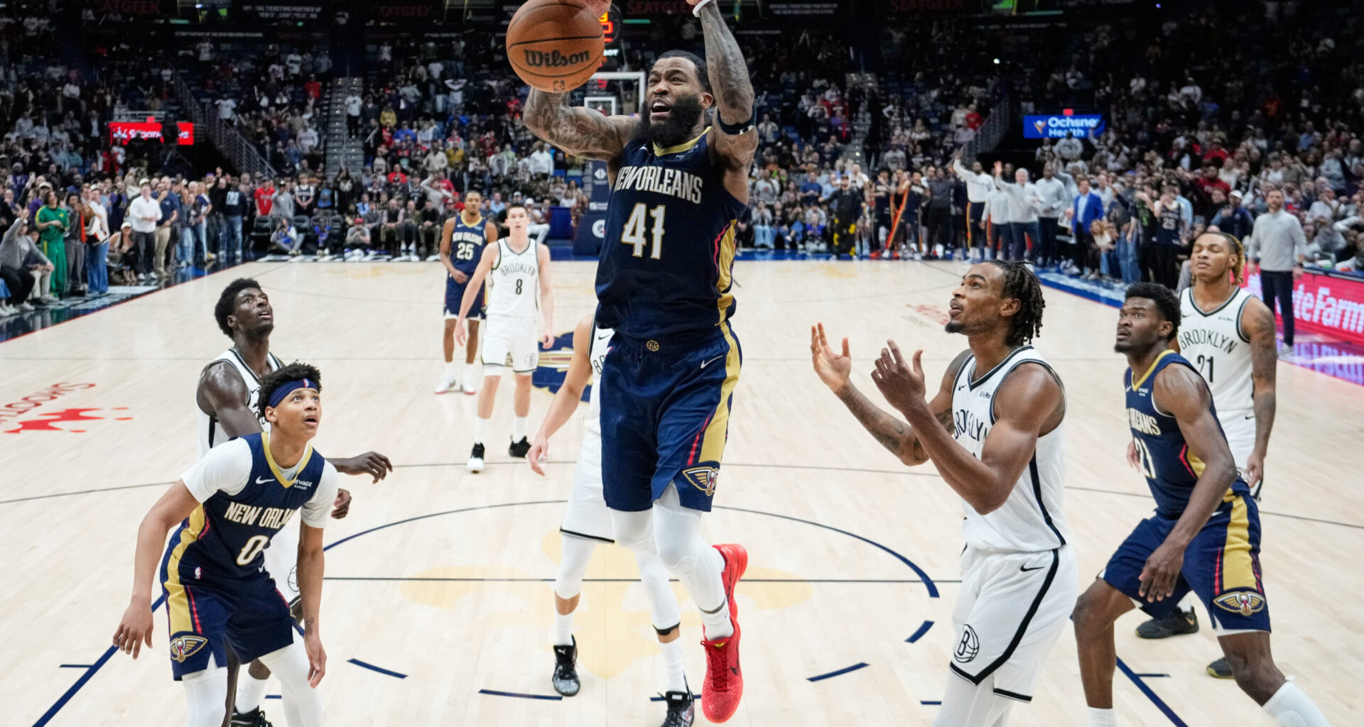 New Orleans Pelicans guard Saddiq Bey (41) slam dunks for the go-ahead basket in the final minute of the second half of an NBA basketball game against the Brooklyn Nets, Wednesday, Jan. 14, 2026, in New Orleans. (AP Photo/Gerald Herbert)