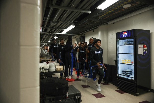 The Magic break a huddle outside the locker room before a game against the Bulls at the United Center on Jan. 2, 2026, in Chicago. (John J. Kim/Chicago Tribune)