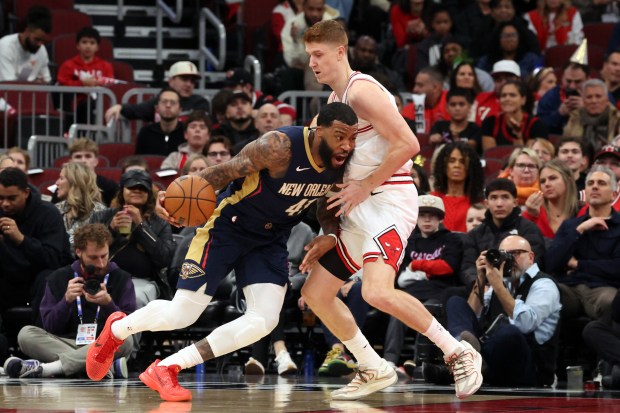 Pelicans guard/forward Saddiq Bey (41) drives on Bulls guard/forward Kevin Huerter (13) in the first half at the United Center on Wednesday, Dec. 31, 2025. (Terrence Antonio James/Chicago Tribune)