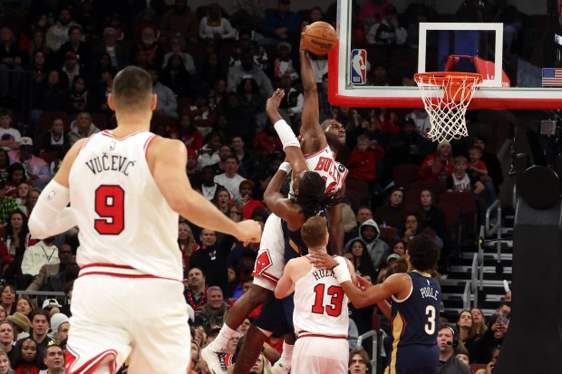 Bulls forward Patrick Williams (44) attempts a dunk against the Pelicans in the second half at the United Center on Wednesday, Dec. 31, 2025. The Bulls won 134 - 118. (Terrence Antonio James/Chicago Tribune)