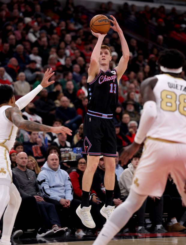 Chicago Bulls guard/forward Kevin Huerter (13) shoots a 3-pointer in the first half of a game against the Boston Celtics at the United Center in Chicago on Jan. 24, 2026. (Chris Sweda/Chicago Tribune)