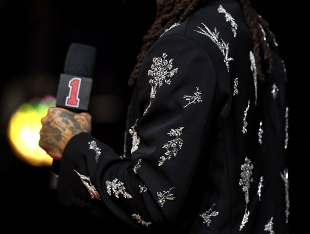 Derrick Rose gives a speech during a ceremony to retire his #1 jersey by the Chicago Bulls at the United Center in Chicago on Jan. 24, 2026. (Chris Sweda/Chicago Tribune)