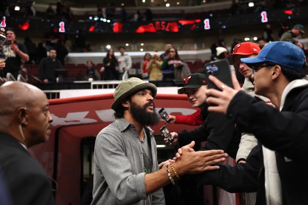 Former Chicago Bulls player Joakim Noah greets fans after attending a ceremony in which the Chicago Bulls retired Derrick Rose's #1 jersey at the United Center in Chicago on Jan. 24, 2026. (Chris Sweda/Chicago Tribune)