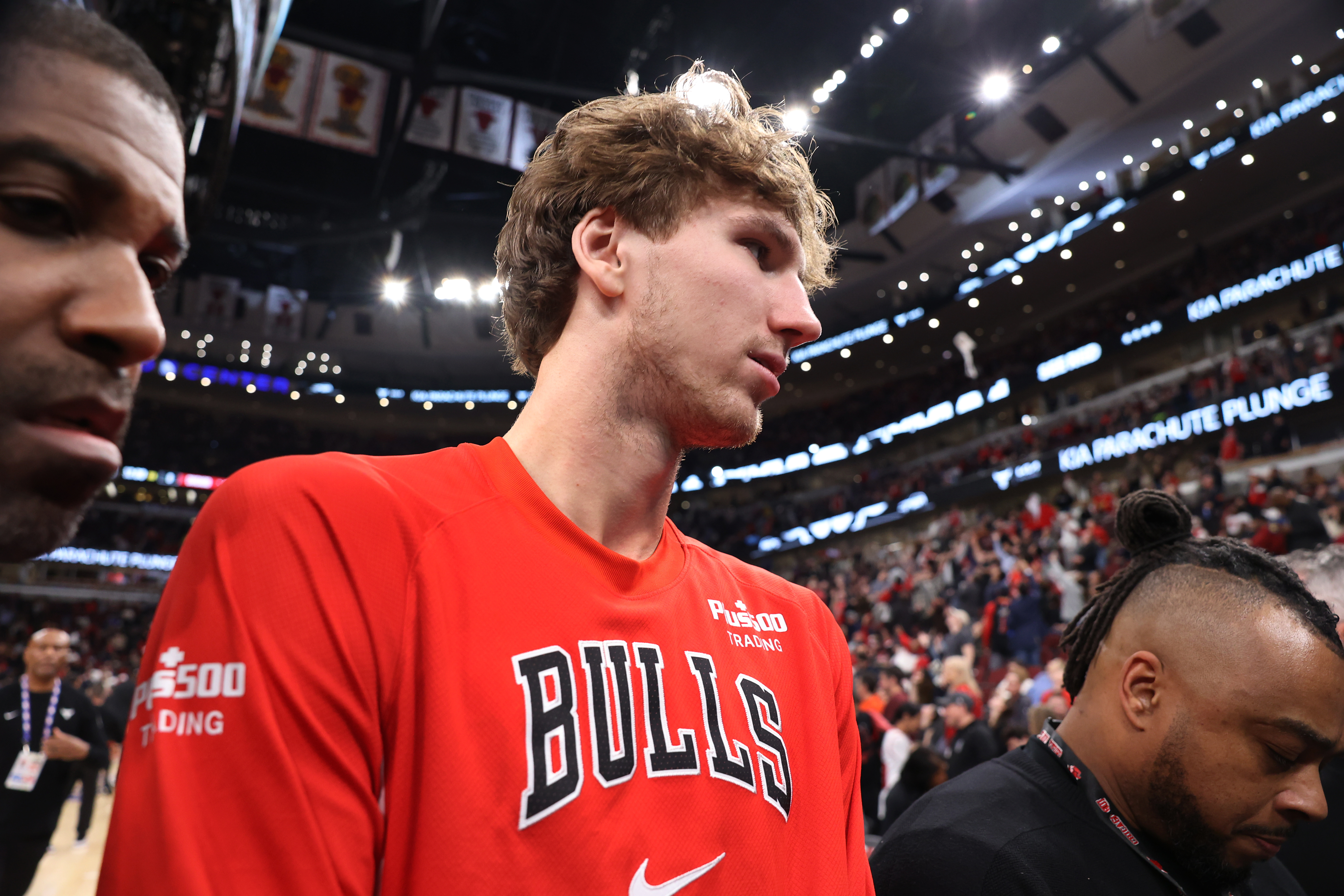 Chicago Bulls forward Matas Buzelis leaves the court after the...
