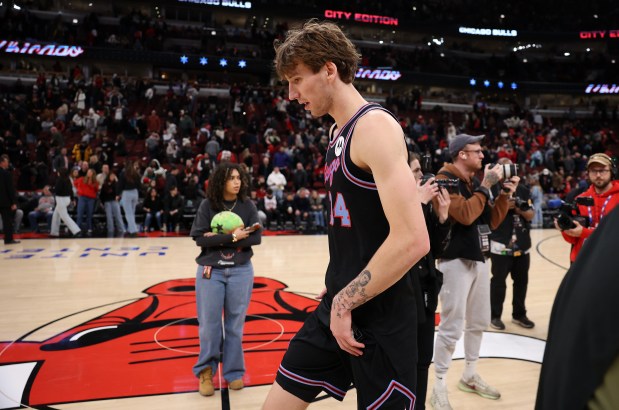 Chicago Bulls forward Matas Buzelis (14) walks off the court after a loss to the Charlotte Hornets at the United Center in Chicago on Jan. 3, 2026. (Chris Sweda/Chicago Tribune)