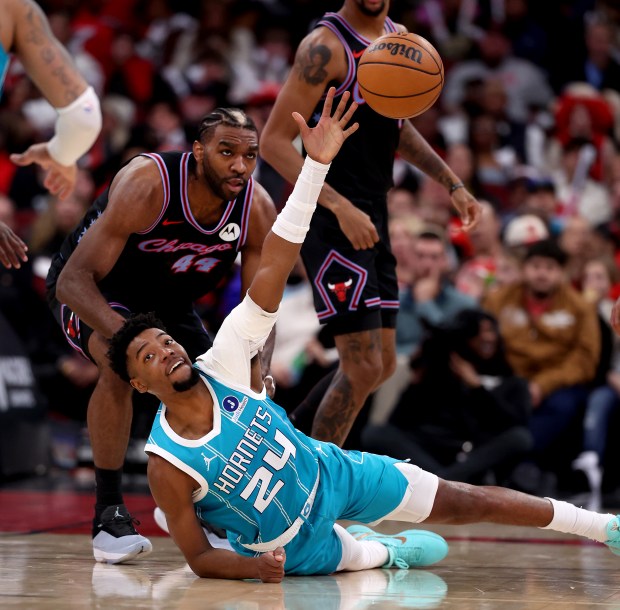Charlotte Hornets forward Brandon Miller (24) and Chicago Bulls forward Patrick Williams (44) battle for a loose ball in the second half of a game at the United Center in Chicago on Jan. 3, 2026. (Chris Sweda/Chicago Tribune)