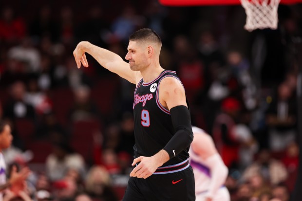 Chicago Bulls center Nikola Vucevic (9) smiles after shooting an air ball during the first quarter against the Utah Jazz at the United Center Jan. 14, 2026 in Chicago. (Armando L. Sanchez/Chicago Tribune)