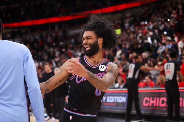 Chicago Bulls guard Coby White (0) smiles after the Bulls defeated the Utah Jazz, 128-126, at the United Center Jan. 14, 2026 in Chicago. (Armando L. Sanchez/Chicago Tribune)