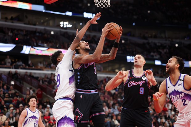 Utah Jazz guard Ace Bailey (19) guards Chicago Bulls forward Dalen Terry (7) during the third quarter at the United Center Jan. 14, 2026 in Chicago. (Armando L. Sanchez/Chicago Tribune)
