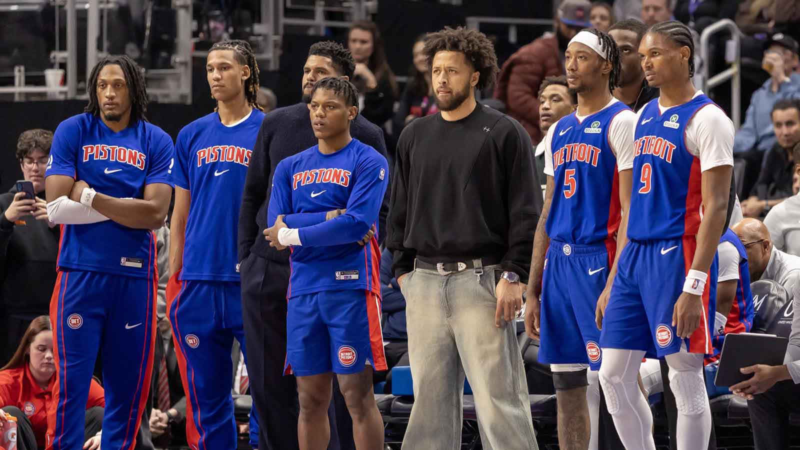 Detroit Pistons guard Cade Cunningham (2) and the rest of the team watch form the bench late in the fourth quarter against the LA Clippers at Little Caesars Arena.
