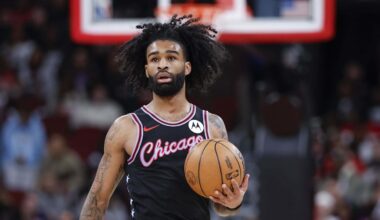 Jan 29, 2026; Chicago, Illinois, USA; Chicago Bulls guard Coby White (0) brings the ball up court against the Miami Heat during the first half at United Center. Mandatory Credit: Kamil Krzaczynski-Imagn Images