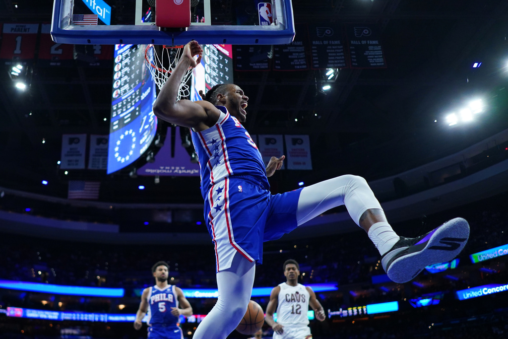 Philadelphia 76ers' Jabari Walker reacts after a dunk during the second half of an NBA basketball game against the Cleveland Cavaliers Wednesday, Jan. 14, 2026, in Philadelphia. 