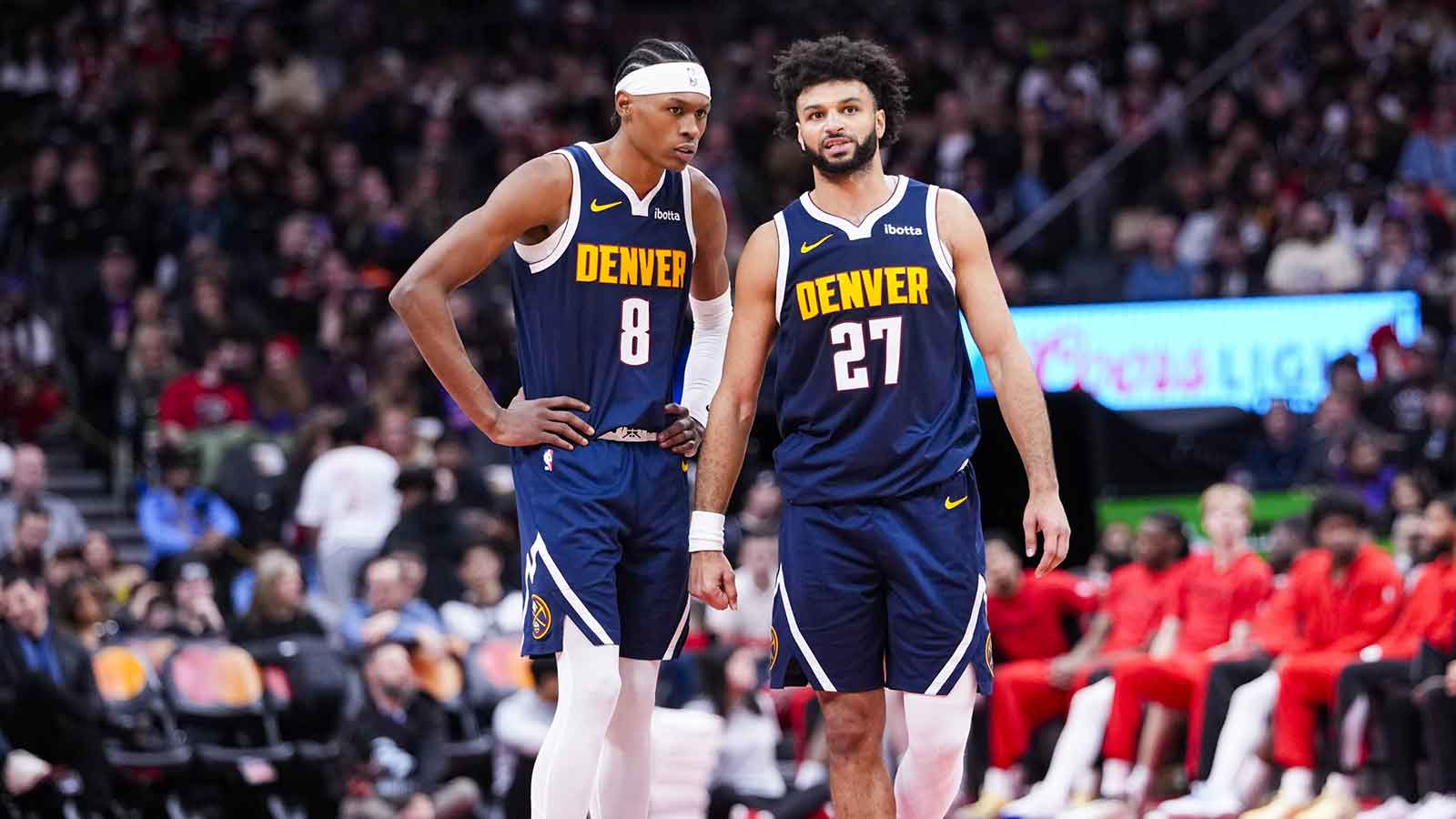 Denver Nuggets guard Jamal Murray (27) stands beside guard Peyton Watson (8) during the second half against the Toronto Raptors at Scotiabank Arena.