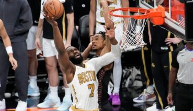 Jaylen Brown (left) goes up for a shot while being guarded by Nets center Nic Claxton on Friday night.